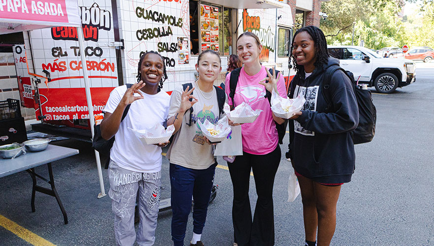 Students with tacos
