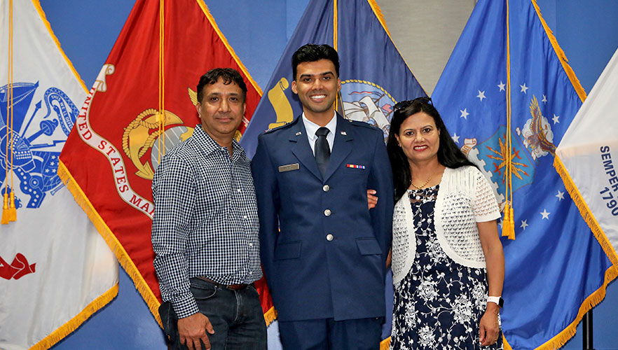 UIWSOM graduate with family