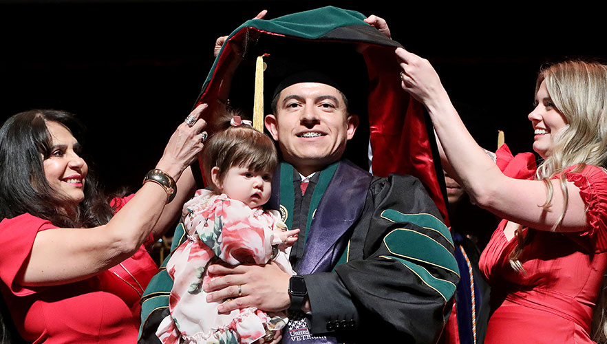 UIWSOM graduate being hooded