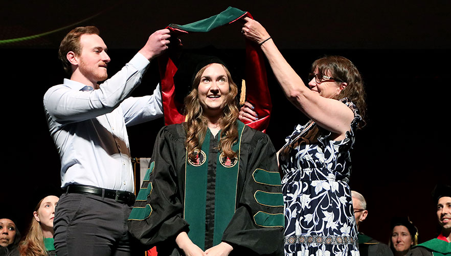 UIWSOM graduate being hooded