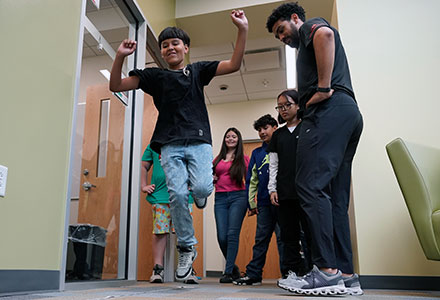 Student jumping during activity