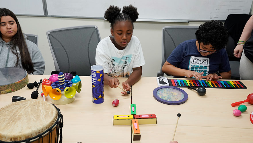 Students playing instruments