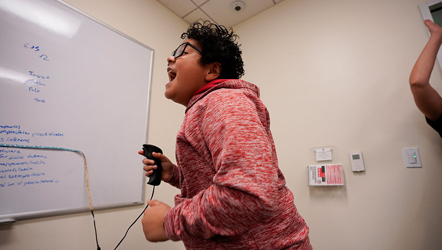 Student participating in activity