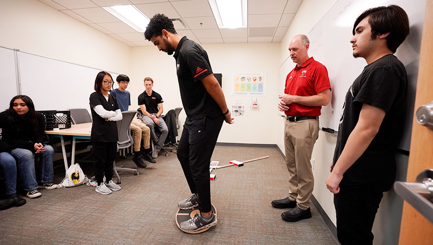 Students watching demonstration
