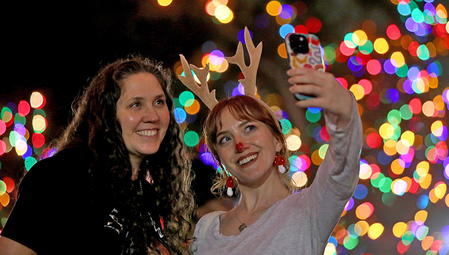 People taking selfie with lights