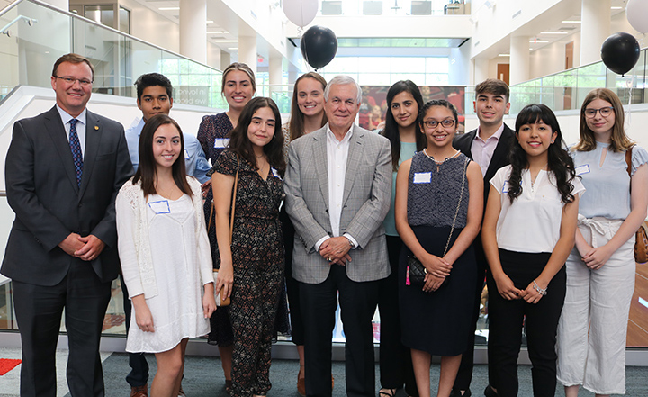 Carlos Alvarez with the UIW Alvarez Scholars 