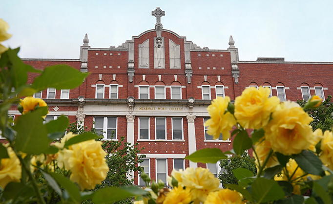 UIW administration building with flowers
