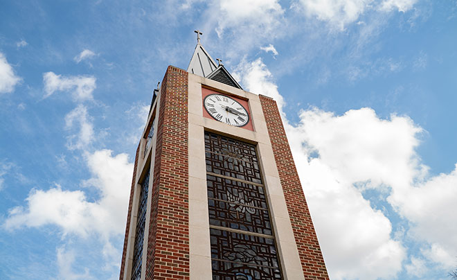 UIW clocktower against a blue sky