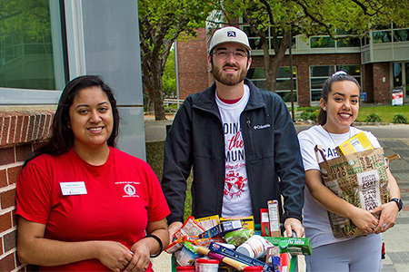 students with basket of food