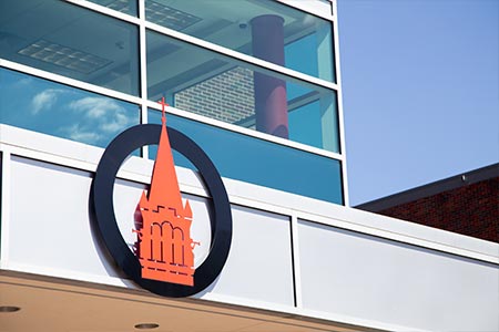 UIW seal on building